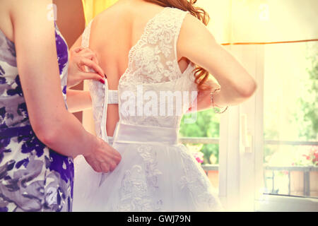 Young bride dresses for wedding. Marriage and wedding concept image. Stock Photo