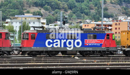 Re 4/4 No 460 080-5  on freight train at Brig railway station, Valais, Switzerland Stock Photo