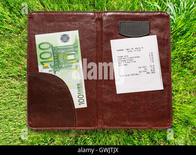 Open check folder with bill and euro banknotes Stock Photo