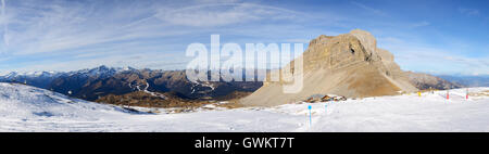 The panorama of ski slope and skiers at Passo Groste ski area, Madonna di Campiglio, Italy Stock Photo
