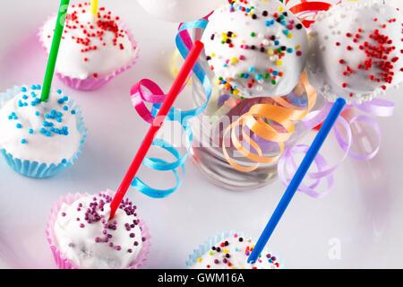 pop candies on white plate. Stock Photo