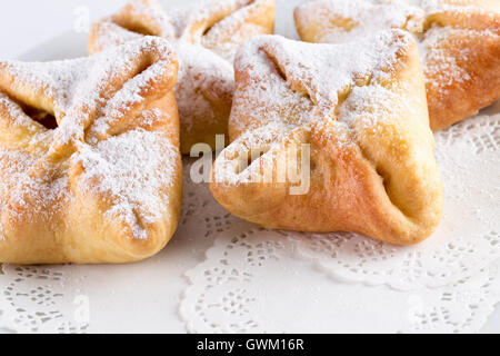 cakes with apples on white plate isolated on the white background. Stock Photo