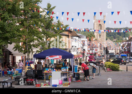 A fundraising stand for Leukemia on Market Place in Henley-on-Thames with Saint Mary's Church in the background, England Stock Photo