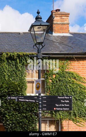 A pedestrian directional signpost in the old market town of Basingstoke Stock Photo