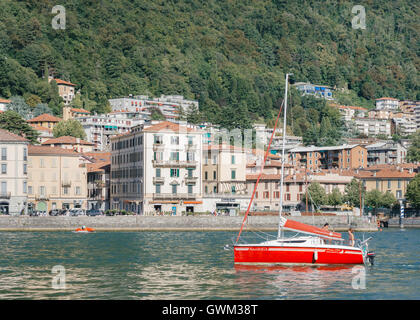 A leisure boat on the shores of Lake Como in Italy. This lake is famous with celebrities. Stock Photo