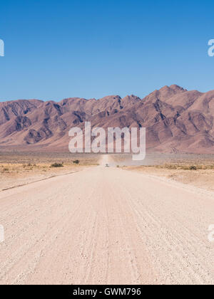 Typical gravel road in Namibia. Stock Photo