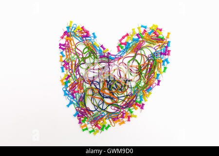 Miscellaneous office supplies in the shape of a heart Stock Photo