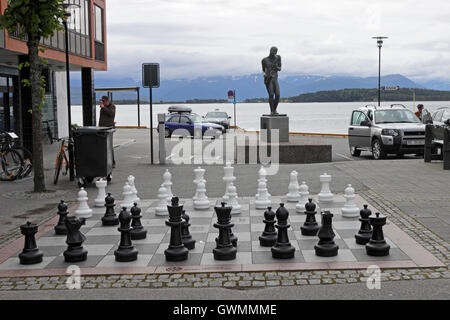 Saxaphonist statue and chess pieces Molde, Norway Stock Photo