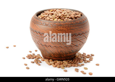 lentils in a clay pot isolated on white background Stock Photo