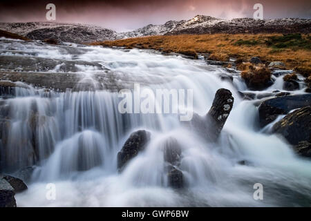 Afon Gwryd and the Glyderau Mountains in Winter, Snowdonia National Park, North Wales, UK Stock Photo