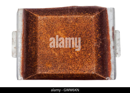 Above view close up of neglected rusty grungy decayed patterns and textures on rusted metal tray surface background Stock Photo