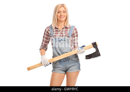 Female worker in overalls holding an axe isolated on white background Stock Photo