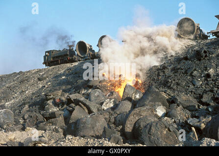 Turkey's Karabuk steel works with Hawthorn Leslie 0-6-0T No. 3302 tipping molten waste down the slag bank, 11th August 1976. Stock Photo