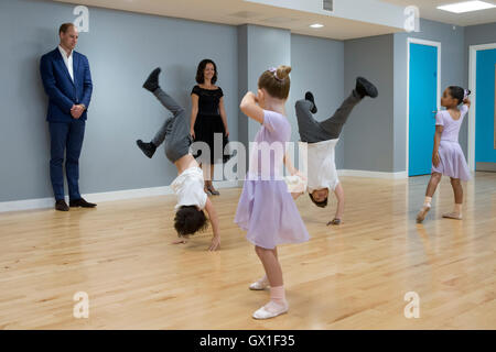 The Duke of Cambridge watches young dancers during a visit to Caius House youth centre, London. Stock Photo