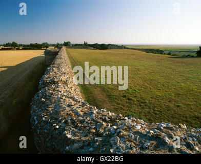 View from NE corner turret along E wall & projecting bastions of Burgh Castle Roman fort, Norfolk, built in C3rdAD against Saxon raiders. Stock Photo