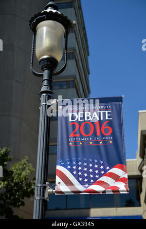 Hempstead, New York, USA. September 13, 2016. On old-fashioned lamppost is Hofstra University Debate 2016 banner in patriotic red white and blue, is one of many displayed on the campus of Hofstra University, which will host the first Presidential Debate, between H.R. Clinton and D. J. Trump, scheduled for later that month on September 26. Hofstra is first university to host 3 consecutive U.S. presidential debates. Credit:  Ann E Parry/Alamy Live News Stock Photo