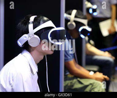 Thursday. 15th Sep, 2016. Visitors try to play virtual videogames with Sony Interactive Entertainment's PlayStation VR at the annual Tokyo Game Show in Chiba, suburban Tokyo on Thursday, September 15, 2016. The 20th anniversary Show includes show a new Virtual Reality (VR) area. The event hosts 614 exhibitors from 37 different countries and runs from September 15 to 18 at the International Convention Complex Makuhari Messe in Chiba. 1,523 game titles for smartphones, games consoles, PC and VR platforms are on show. Credit:  Yoshio Tsunoda/AFLO/Alamy Live News Stock Photo