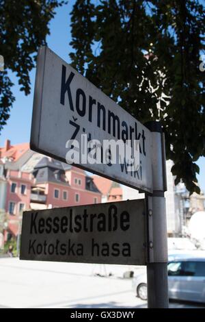 Bautzen, Germany. 15th Sep, 2016. A street sign written with 'Kornmarkt' (lit. grain market) in German and Sorbian can be seen Kornmarkt in Bautzen, Germany, 15 September 2016. On 14 September 2016 there were violent altercations here between men and women prepared to use violence and young asylum-seekers. Photo: SEBASTIAN KAHNERT/dpa/Alamy Live News Stock Photo