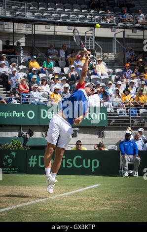 Sydney, Australia. 16th Sep, 2016. Andrej Martin of Slovakia serves to Nick Kyrgios of Australia during the Davis Cup World Group playoff in Sydney, Australia, Sept. 16, 2016. Nick Kyrgios won 3-0. © Zhu Hongye/Xinhua/Alamy Live News Stock Photo