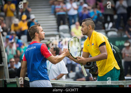 Sydney, Australia. 16th Sep, 2016. Nick Kyrgios (R) of Australia and Andrej Martin of Slovakia shake hands after their match at the Davis Cup World Group playoff in Sydney, Australia, Sept. 16, 2016. Nick Kyrgios won 3-0. © Zhu Hongye/Xinhua/Alamy Live News Stock Photo