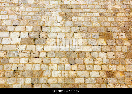 Old tile stoves, the ocher stone background. Stock Photo