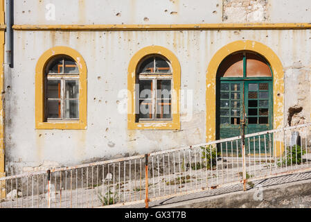 Abandoned building, damaged during the Yugoslavian Wars. Mostar, Bosnia-Herzegovina Stock Photo