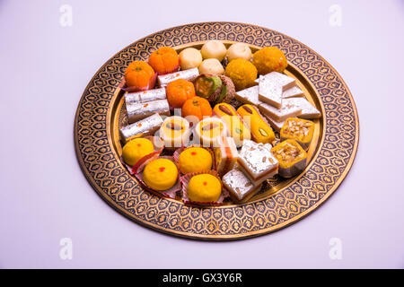 indian sweet food consumed in festivals like diwali, holi, dussehra, gudhi padwa or weddings Stock Photo