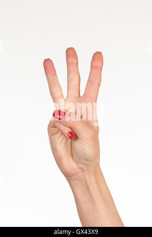 Woman's hand counting three Stock Photo