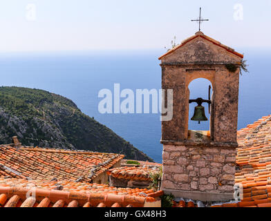 Red roof chapel cross with Mediterranean sea view at the French Riviera Stock Photo