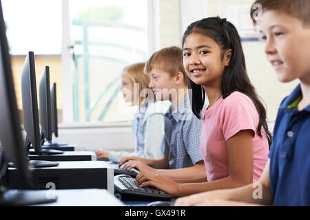 Female Elementary Pupil In Computer Class Stock Photo