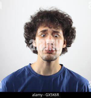 Portrait of a crazy young men. Stock Photo