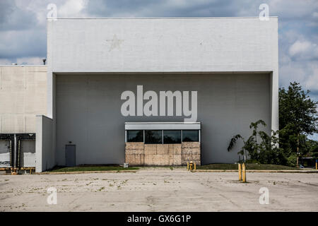 An outline of a logo sign outside of a closed Macy's retail store in Columbus, Ohio on July 23, 2016. Stock Photo