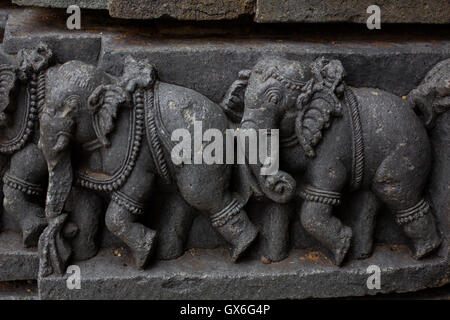 Elephant sculptures on the wall panel relief and molding frieze in horizontal treatment in Chennakesava Temple, Somanathapura