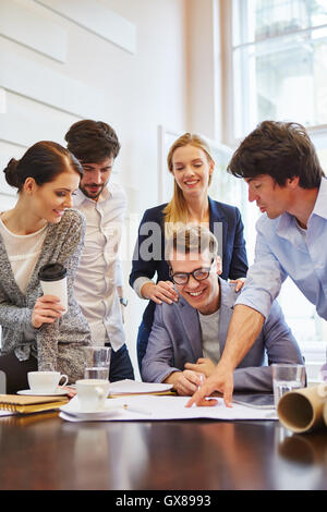 Business people team in meeting planning new strategy for start-up company Stock Photo