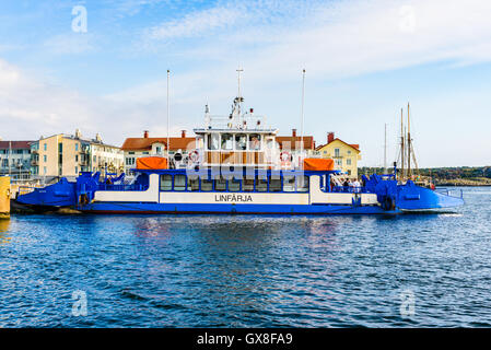 Marstrand, Sweden - September 8, 2016: Environmental documentary of the cable ferry (Linfarga) between mainland and the Marstran Stock Photo