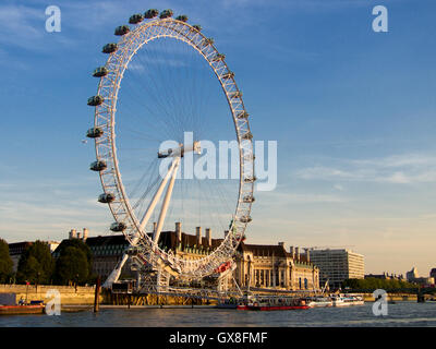 View of London Eye and the County Hall from Thames River in the evening, London, England Stock Photo