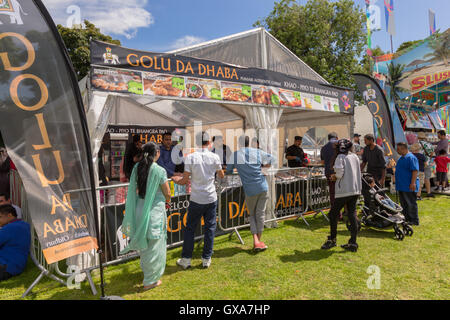 Fast food stall at an open air event during a British Asian event in a public park. Stock Photo