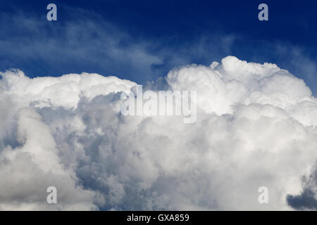 high cumulus clouds on a blue sky Stock Photo