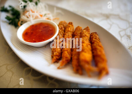 Deep fried prawns with sauce, Vietnamese speciality Stock Photo