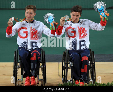 (left-right) Great Britain's Gordon Reid and Alfie Hewett celebrate with the Silver Medal in the Men's Doubles Wheelchair Tennis during the eighth day of the 2016 Rio Paralympic Games in Rio de Janeiro, Brazil. Stock Photo