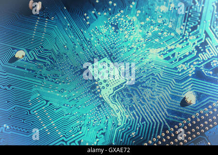 Electronic circuit board close up. blue PCB Stock Photo