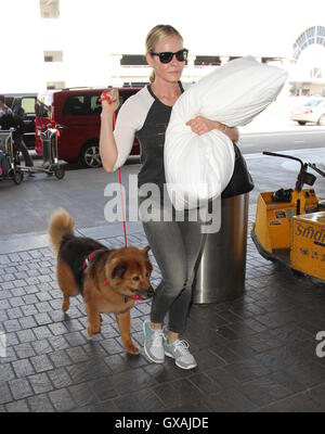 Chelsea Handler seen with her dog and carrying a white pillow as she departs from Los Angeles International Airport (LAX)  Featuring: Chelsea Handler Where: Los Angeles, California, United States When: 30 Jun 2016 Stock Photo