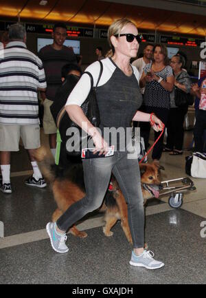 Chelsea Handler seen with her dog and carrying a white pillow as she departs from Los Angeles International Airport (LAX)  Featuring: Chelsea Handler Where: Los Angeles, California, United States When: 30 Jun 2016 Stock Photo