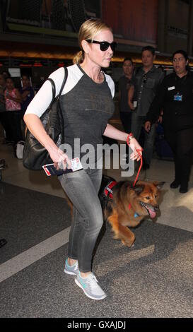 Chelsea Handler seen with her dog and carrying a white pillow as she departs from Los Angeles International Airport (LAX)  Featuring: Chelsea Handler Where: Los Angeles, California, United States When: 30 Jun 2016 Stock Photo