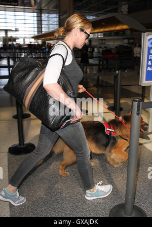 Chelsea Handler seen with her dog and carrying a white pillow as she departs from Los Angeles International Airport (LAX)  Featuring: Chelsea Handler Where: Los Angeles, California, United States When: 30 Jun 2016 Stock Photo