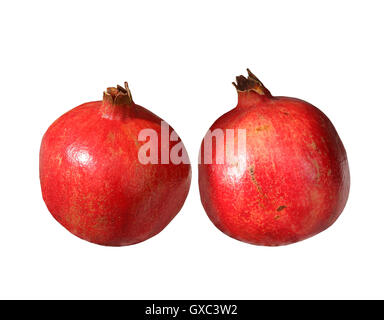 two bright and ripe pomegranates isolated on white Stock Photo