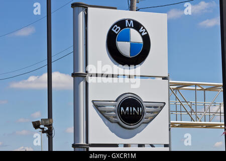 Indianapolis - Circa July 2016: A Local BMW and Mini Dealership. BMW is a Luxury Car Manufacturer Based in Germany III Stock Photo