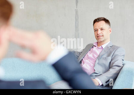 Two businessmen meeting in office Stock Photo