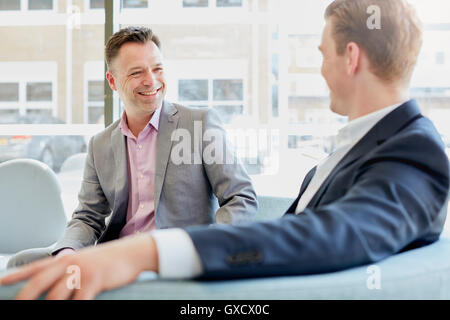 Two  businessmen having discussion at office meeting Stock Photo