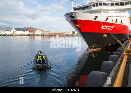 Nordlys Hurtigruten ferry ship at Svolvaer, Lofoten Islands, Nordland, Norway -adventure expedition boat setting off Stock Photo